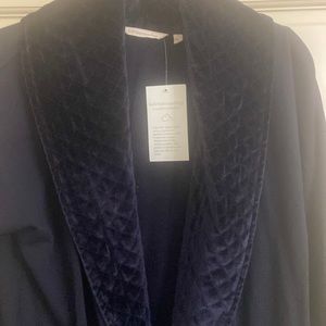 Jet black brand new velvet trimmed jacket.
